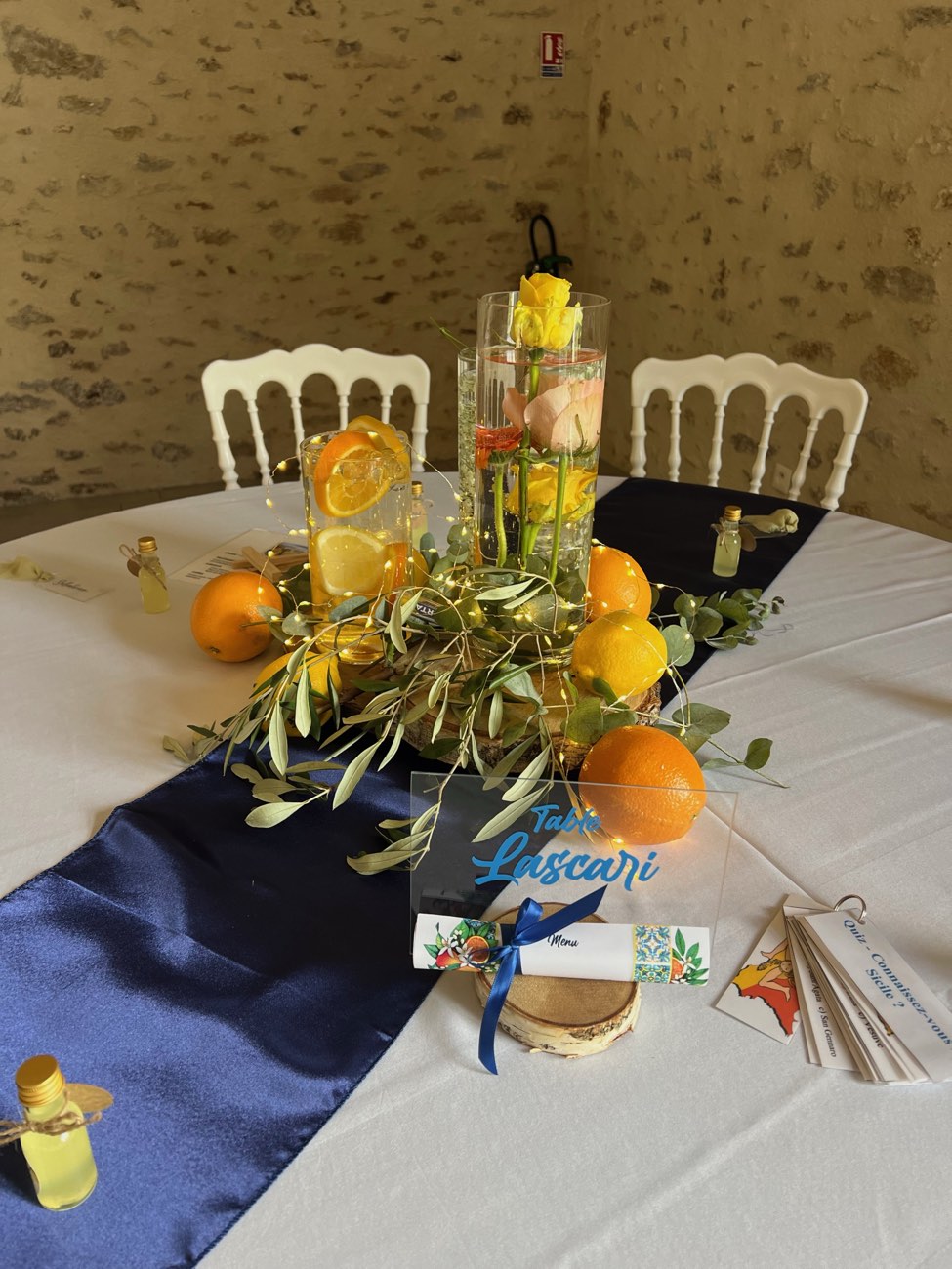 Décoration de mariage : Centre de table agrumes et olivier, thème Sicile