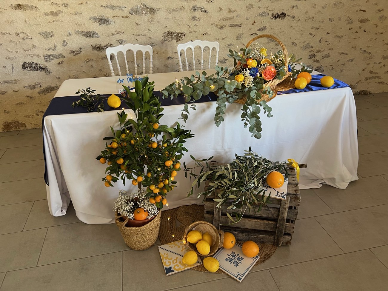 Décoration de mariage : Table d'honneur agrumes et olivier, thème Sicile